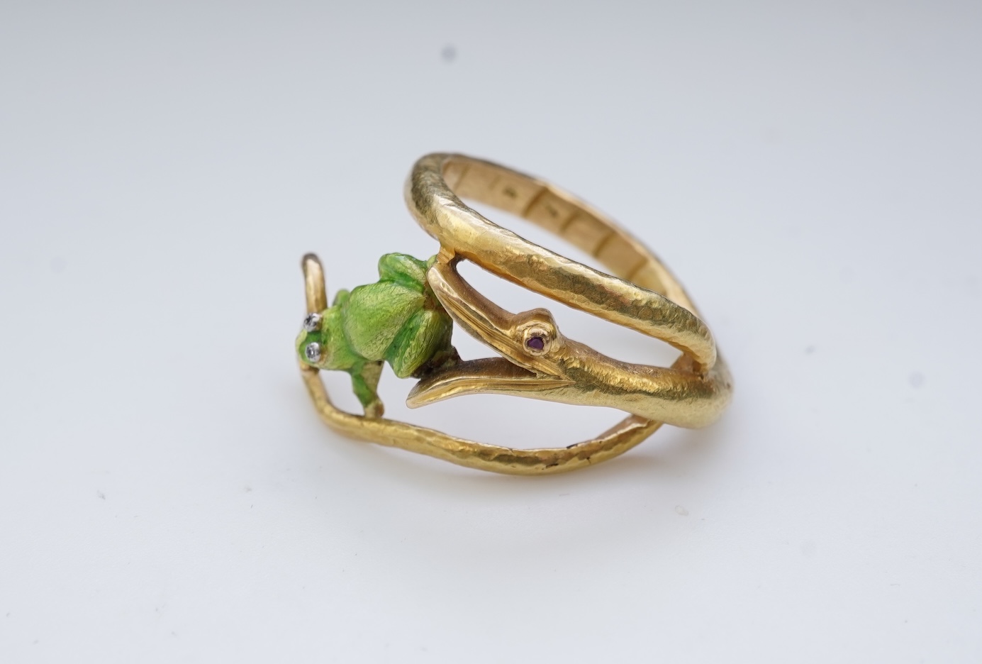 An unusual gold and enamel novelty ring
